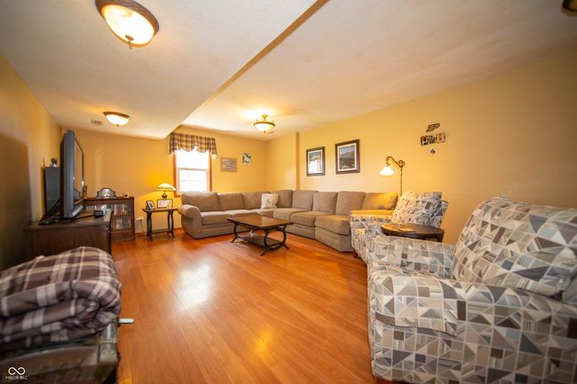 Spacious room with neutral decor. | Image 15