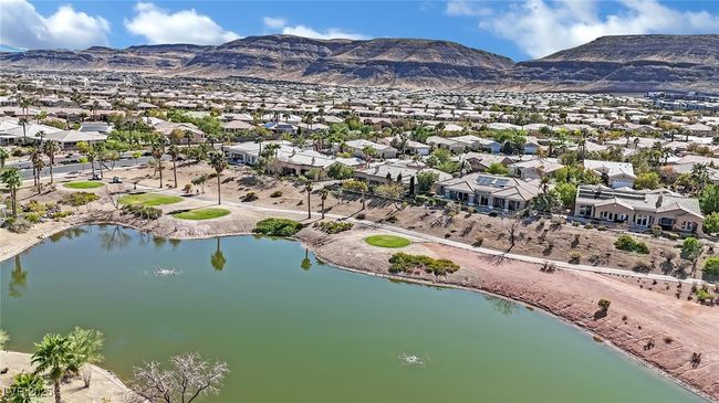 Drone / aerial view with a residential view and a water and mountain view | Image 49