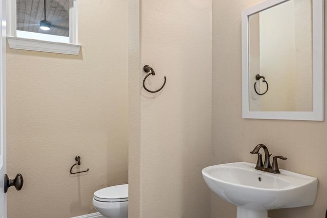 Half bathroom with pedestal sink | Image 25