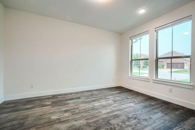 Unfurnished room with baseboards, dark wood-type flooring, and recessed lighting | Image 17
