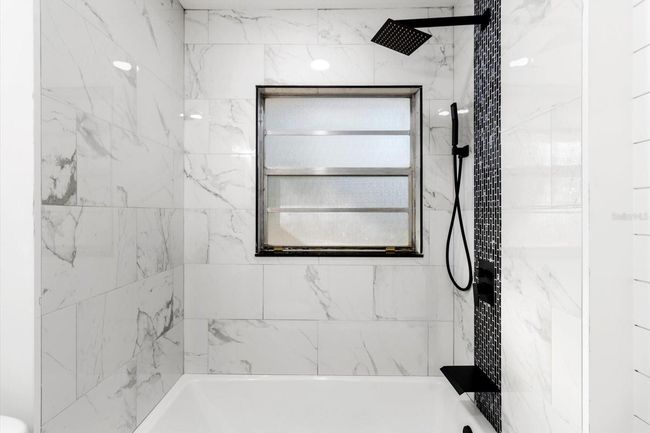Renovated Full Bath... Tub/Shower Combo w/ NEW Tile Surround & Accent Stripe & NEW Waterfall Tub Spout, Rainfall Shower Head & Handheld Wand | Image 24