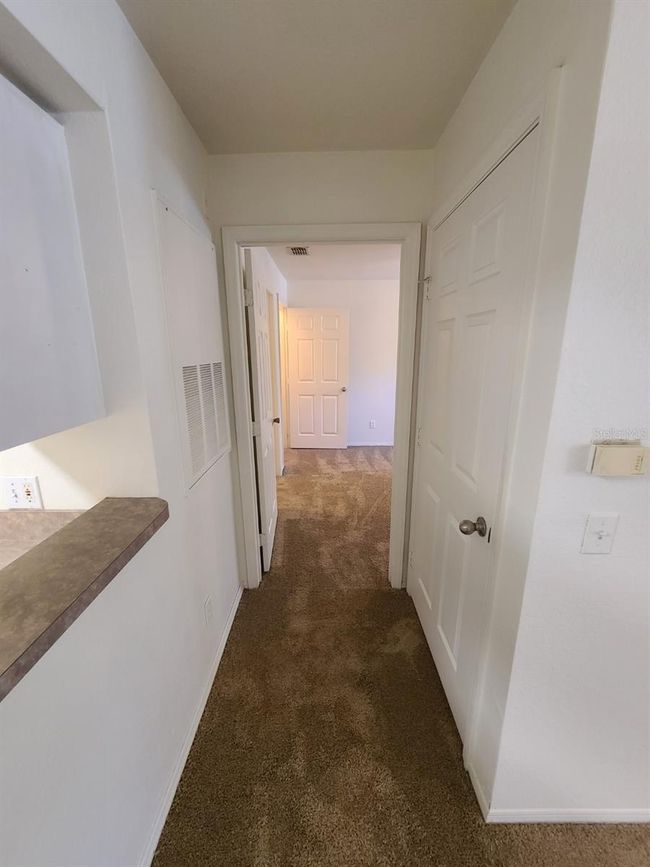 Hallway to 2nd bedroom | Image 19