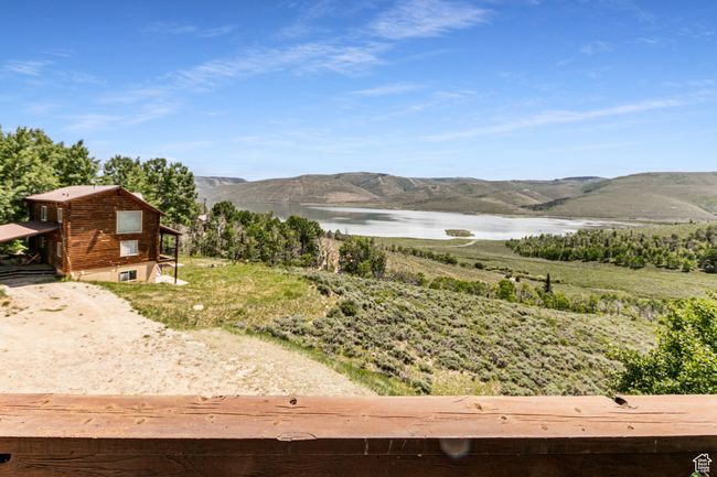 View of mountain background featuring a large body of water | Image 17