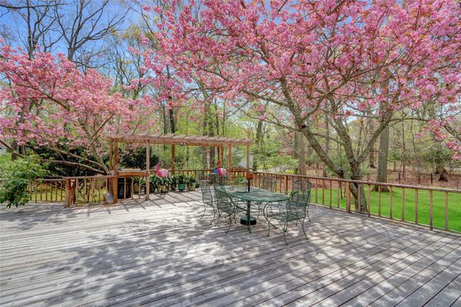 Deck with a pergola and outdoor dining space | Image 30