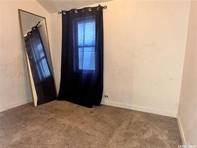 Spare room with carpet and baseboards | Image 6