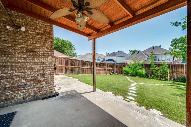 with a covered patio & outdoor fan | Image 26