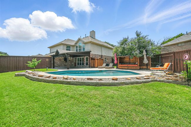 A large covered patio, pool, cabana, & you still have yard! | Image 32