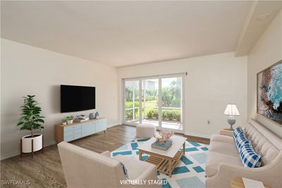 Living room featuring wood-type flooring | Image 3