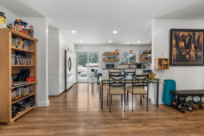 Dining room featuring recessed lighting and wood finished floors | Image 13
