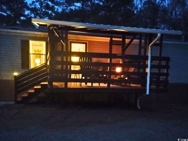 View of back of house at night | Image 31