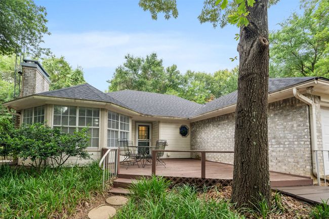 Enjoy your morning coffee on the front deck which enjoys water views. | Image 4