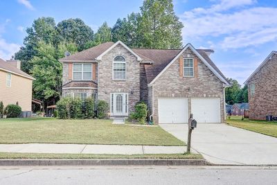 6386 Celtic Drive Sw, House other with 4 bedrooms, 2 bathrooms and 2 parking in Fulton GA | Image 1