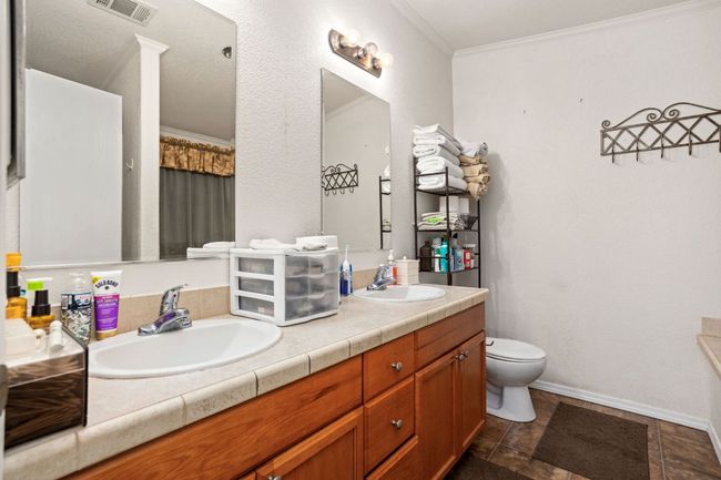 Primary bathroom with double vanity area | Image 26