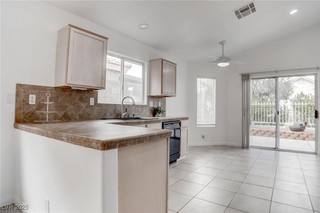 Kitchen featuring decorative backsplash | Image 10