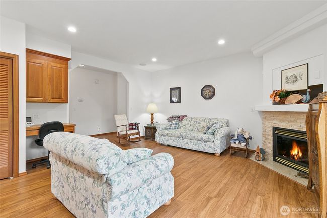 Family room with gas fireplace. | Image 19