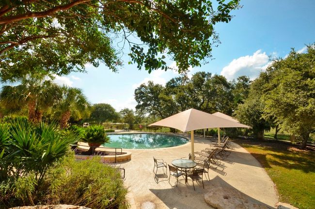 Centrally located and thoughtfully designed, the Town Square pool blends shaded lounge areas, lap lanes, and kid-friendly zones—making it a true gathering spot for all ages | Image 36