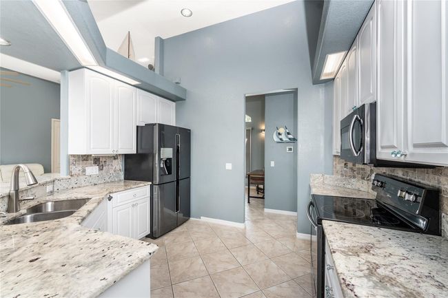 15674 Applewhite Cir, House other with 3 bedrooms, 3 bathrooms and null parking in Port Charlotte FL | Image 22