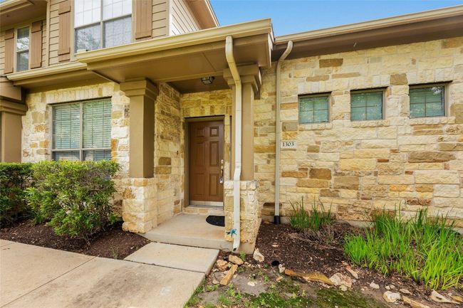 Property entrance featuring stone siding | Image 6
