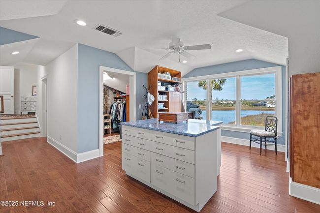 Primary Closet Area w/ Island Storage | Image 49