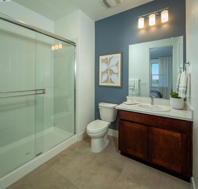 Photo is of the model home and not the actual home for sale. | Image 7