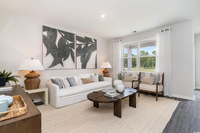 Living area with baseboards, visible vents, and recessed lighting | Image 11