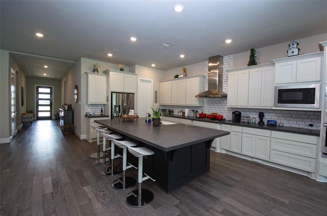 Kitchen featuring upgraded OmegaStone countertops. | Image 8