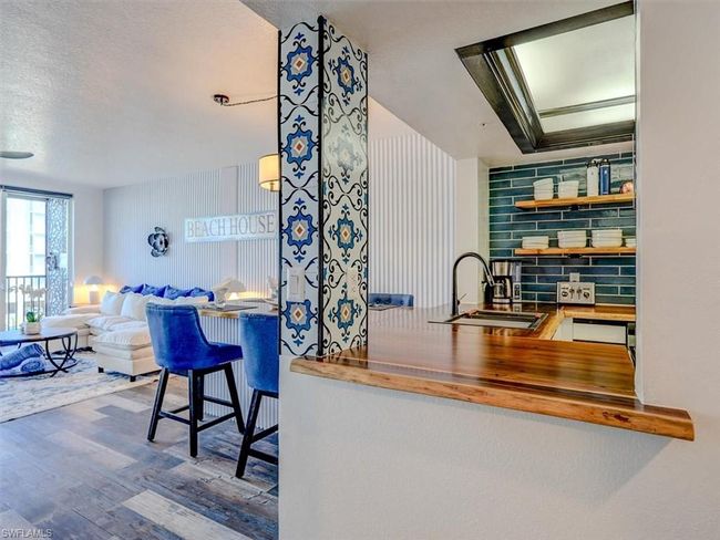 VIEW INTO KITCHEN AREA | Image 11
