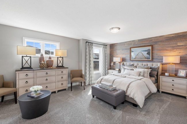 (Photo of a decorated model, actual homes finishes will vary) Find your retreat in this stunning owner's suite. Enjoy the exclusivity of a private bath and huge walk-in closet. | Image 9