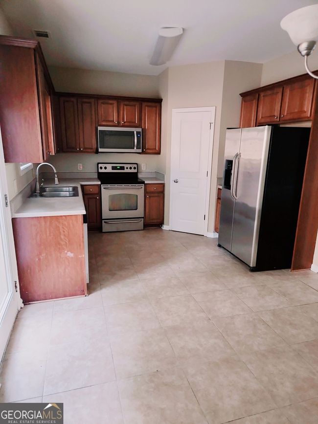 3645 Mcclaren Way, Townhouse with 3 bedrooms, 3 bathrooms and 2 parking in Lawrenceville GA | Image 5