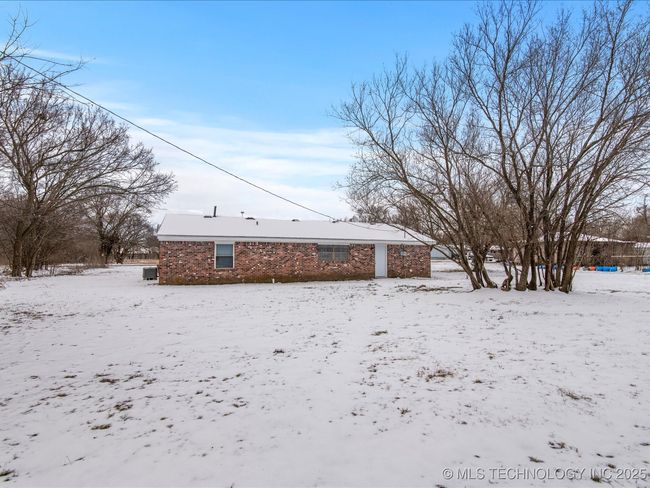 Another view of back yard and back of the home. | Image 23