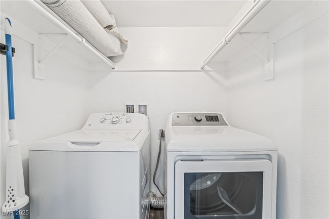 Washroom featuring washer and dryer | Image 18