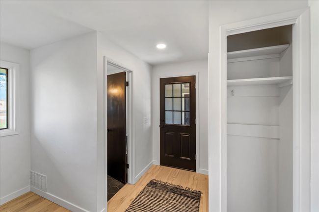 Doorway to outside with wood-type flooring | Image 19