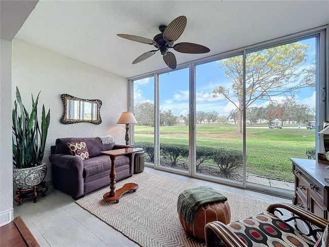 Back lanai with panoramic view of Tara 6th fairway and pond | Image 24