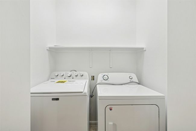 Laundry room with washer and dryer | Image 19