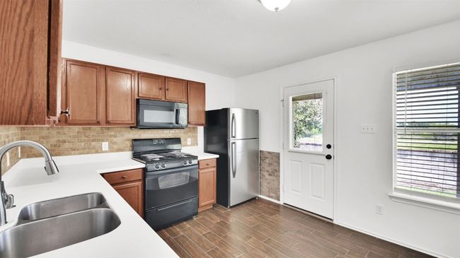 13124 Winecup Mallow Trl, House other with 3 bedrooms, 2 bathrooms and 3 parking in Elgin TX | Image 10