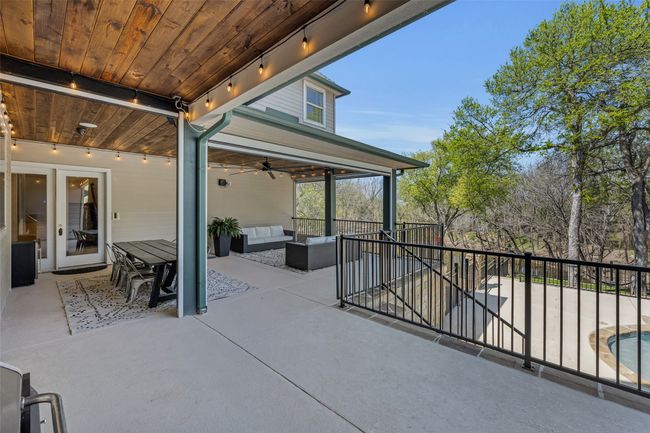 So many opportunities for entertaining under this massive covered patio overlooking the pool | Image 34