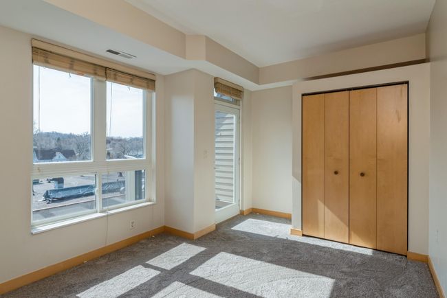 All 4 bedrooms are nicely sized and have large closets too. (The photos are of unit 401. Owned by the same person and finishes that are VERY similar) | Image 19