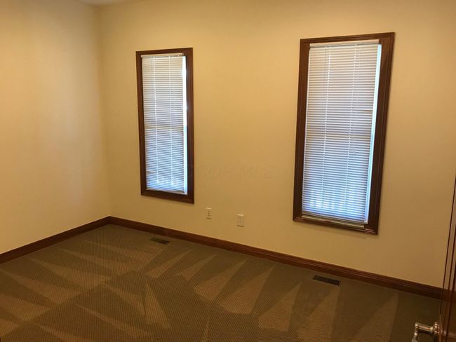 Single small 2nd floor office with lots of windows and great views. | Image 12