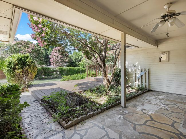 View of patio featuring ceiling fan and a deck | Image 34