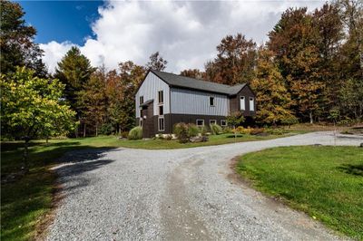 View of home's exterior featuring a yard | Image 3