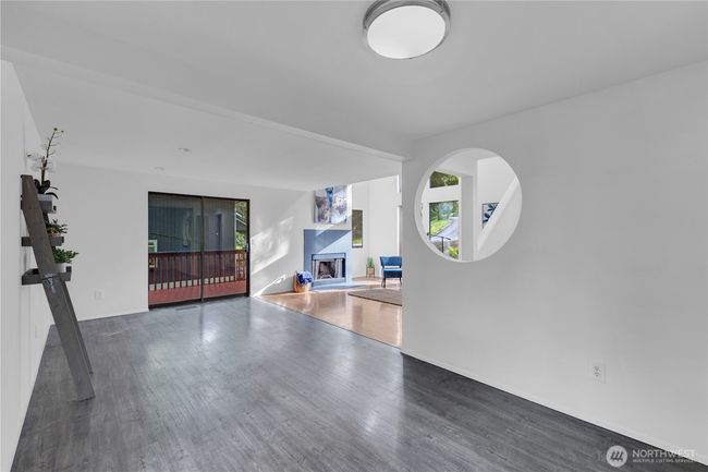 Dining room to living room and slider. | Image 4