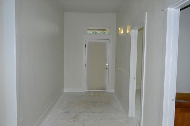 Hall featuring baseboards | Image 6