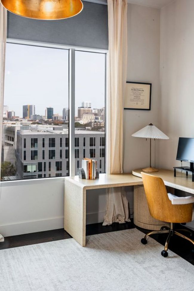 Office area featuring a city view and wood finished floors | Image 34