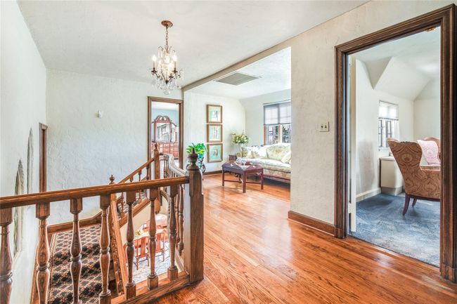Second floor landing featuring a sitting area | Image 12