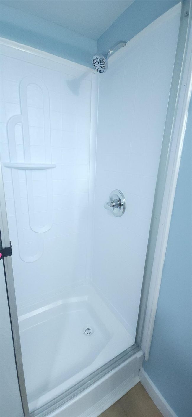 Full bathroom with a shower | Image 18