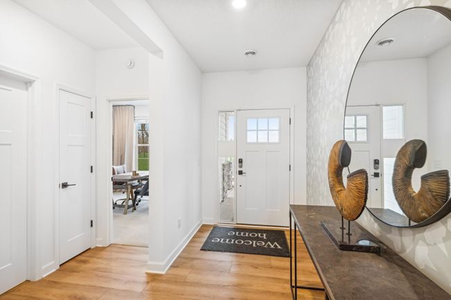 Photo is of the actual model. Make the best first impression with this bright and open foyer. | Image 9