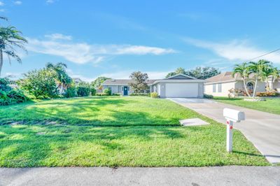 1202 Se Mcfarlane Avenue, House other with 3 bedrooms, 2 bathrooms and null parking in Port St Lucie FL | Image 1