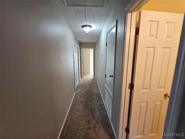 Hallway to other bedrooms and bathroom | Image 20