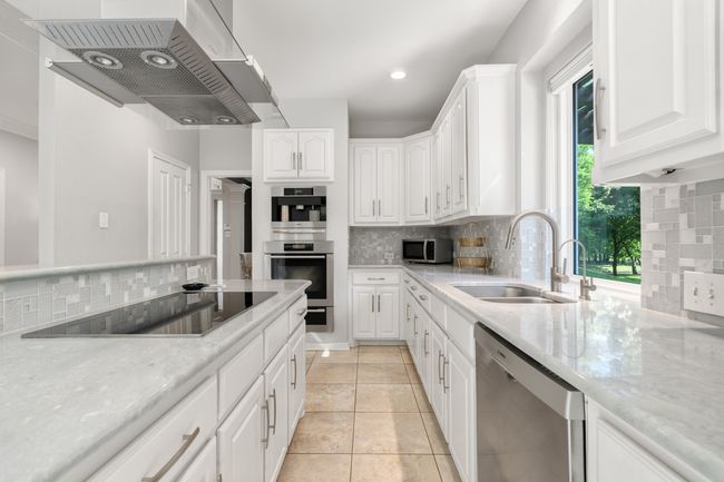 7955 Enclave Way, House other with 4 bedrooms, 3 bathrooms and null parking in Dallas TX | Image 23