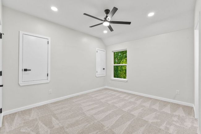 3rd bedroom with new carpet, paint, ceiling fan & lighting | Image 25